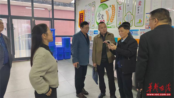 岳阳平江县考察团赴南县洗马湖学校交流食堂精细化管理