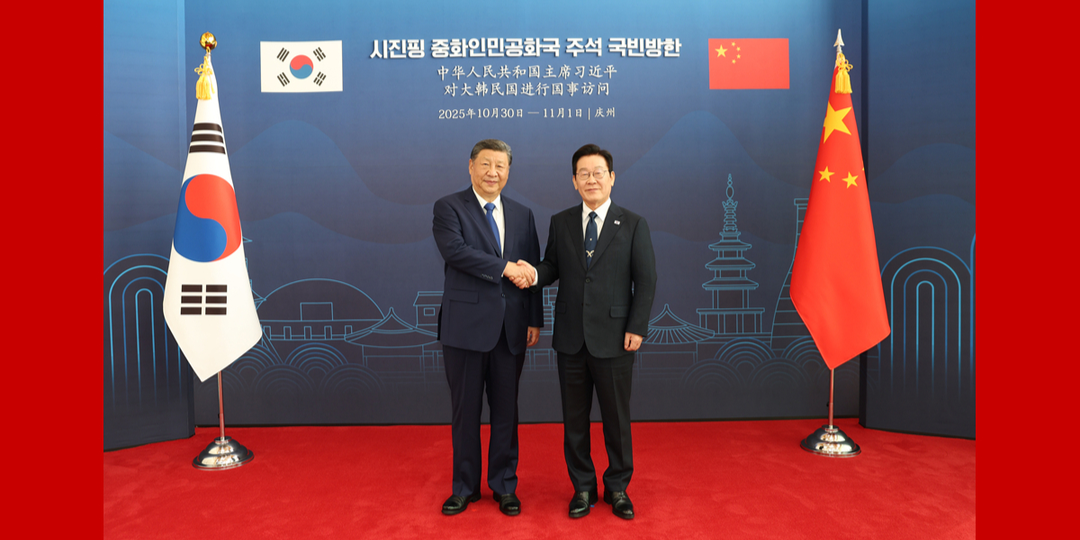 习近平同韩国总统李在明会谈