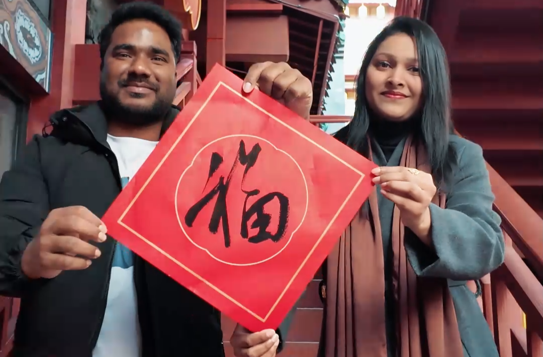 外国人的中国年 定格最暖烟火气