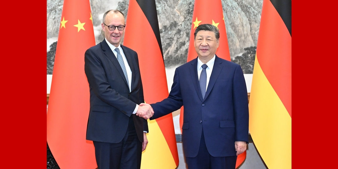 习近平会见德国总理默茨