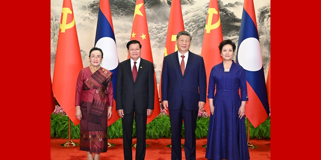 习近平同老挝人民革命党中央总书记、国家主席通伦举行会谈